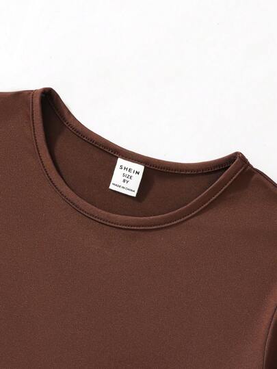 SHEIN مجموعة قميص رياضي بأكمام قصيرة وبنطلون طويل وسروال قصير لفتاة صغيرة، 3 قطع، متعدد الألوان