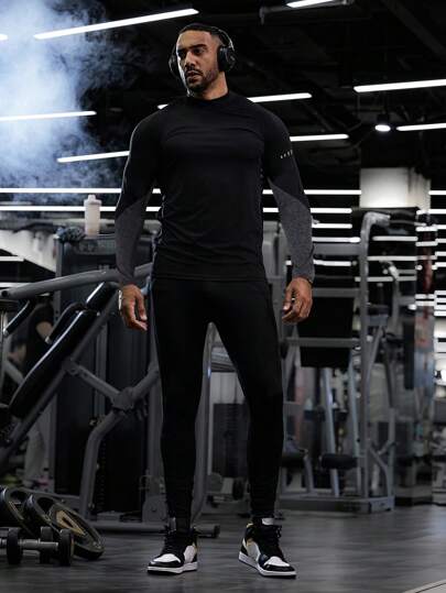 Manfinity Sport Corelite تي شيرت رياضي طويل الأكمام بأكمام ملونة وسحاب للرجال بطراز صديق