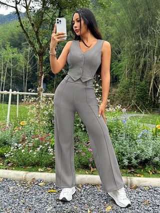PETITE مجموعة 2 قطعة تحتوي على سترة بسيطة بلون صامد وبنطلون كاجوال بأزرار أمامية للنساء