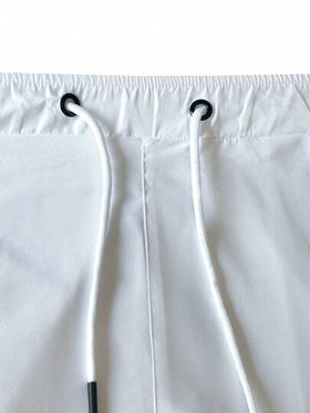 Manfinity Homme شورت رجالي فضفاض مع جيوب مائلة وخصر بسحاب