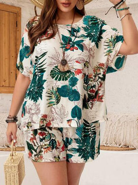EMERY ROSE مجموعة عطلة عبارة عن ملابس علوية أكمام قصيرة بياقة مستديرة وشورت مطبوع بالنباتات بحجم زائد للصيف