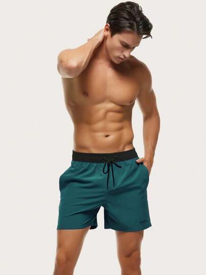 Manfinity Swimmode شورت شاطئ ذو خصر مربوط بسير بالألوان المركبة للرجال، هاواي