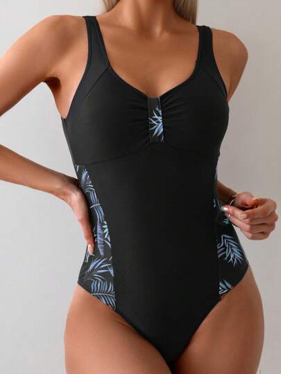 مايوه حريمي قطعة واحدة Swim SPRTY مايوه نسائي مقطع واحد للشاطئ في الصيف بطبعات النباتات وتفاصيل الريش، ظهر مفتوح، وياقة دائرية