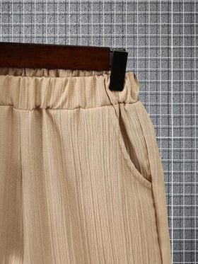 طقم قميص وشورت للأولاد، قميص بياقة وأكمام قصيرة، لون أحادي، نسيج متموج خفيف وقابل للتنفس، مناسب للربيع والصيف