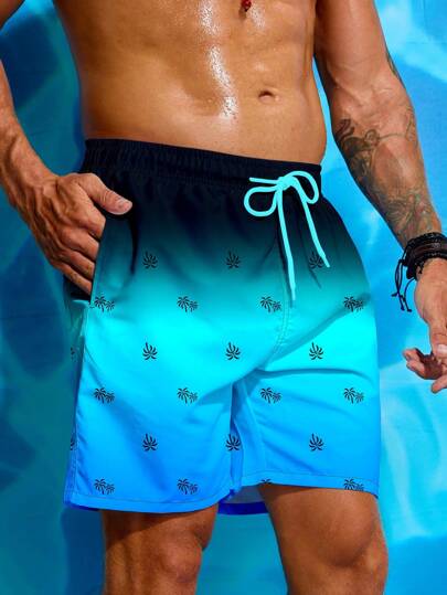 Manfinity Swimmode شورتات شاطئية فضفاضة بسحاب وطبعة أشجار النخيل للرجال للعطلات والاستحمام في المسبح ، لارتداء على الشاطئ وخلال العطلات ، ملابس شاطئية رجالية شاطئية هاواي