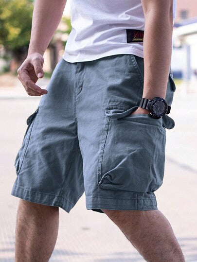 Manfinity Homme شورت رجالي فضفاض مع جيوب جانبية