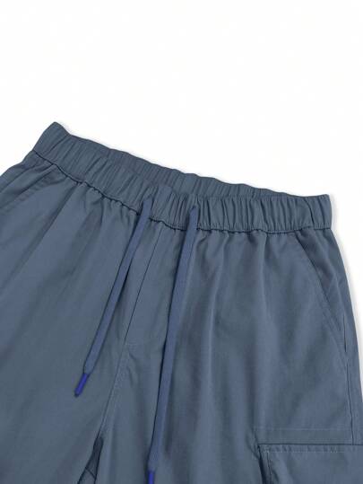 Manfinity Homme شورت رجالي فضفاض مع جيوب جانبية