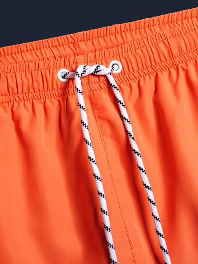 Surfspeed شورت بكماليات مطاطية وخصر منسدل برباط للرجال بلون صلب لقضاء العطلات على الشاطئ