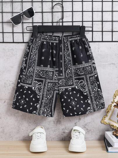 SHEIN سروال رياضي عصري ومريح للولد في المرحلة الانتقالية، طبعات أزرق فاتح، مصنوع من نسيج مضفر واسع