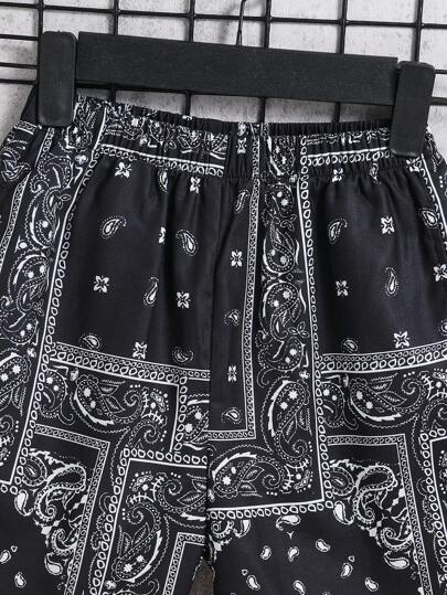 SHEIN سروال رياضي عصري ومريح للولد في المرحلة الانتقالية، طبعات أزرق فاتح، مصنوع من نسيج مضفر واسع
