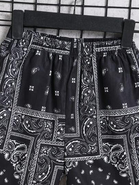 SHEIN سروال رياضي عصري ومريح للولد في المرحلة الانتقالية، طبعات أزرق فاتح، مصنوع من نسيج مضفر واسع