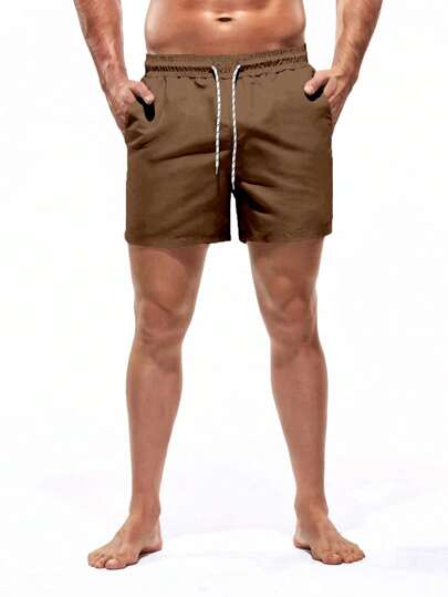 Manfinity Swimmode سروال بحري فضفاض بخصر مطاطي ورباط للرجال ملون بألوان سادة للعطلات