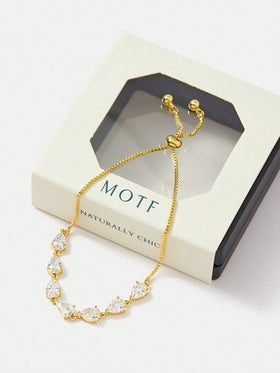 MOTF PREMIUM سوار مرصع بالزركون الكعبي بشكل ورقة مطلي بالذهب عيار 18