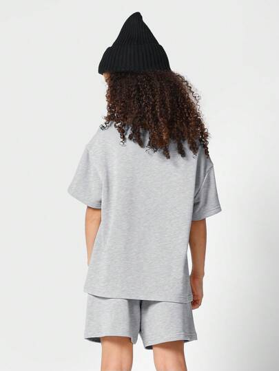 girls-sets SUMWON طقم بلوزة للأطفال غير مميزة مع طبعة وسروال قصير بقطعتين