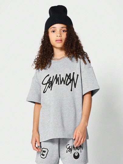 girls-sets SUMWON طقم بلوزة للأطفال غير مميزة مع طبعة وسروال قصير بقطعتين