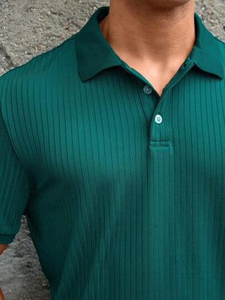 Manfinity Homme قميص بولو أنيق بألوان صلبة تتميز بأضلاع جميلة للرجال