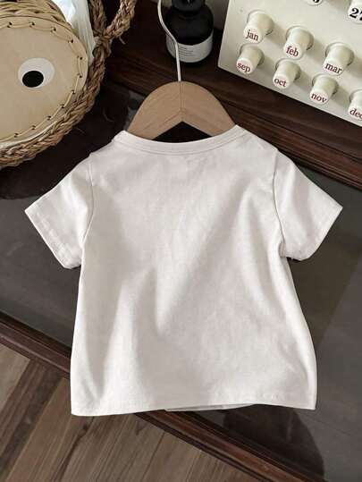 SHEIN Vintaside Kids بلوزة رقبة دائرية مطبوعة بزهور للبنات الرضع، الربيع/الصيف