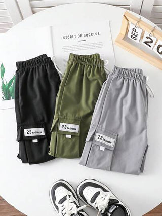 SHEIN بناطيل شحن ذات خيط للشباب مطبوع عليها حرف كاجوال
