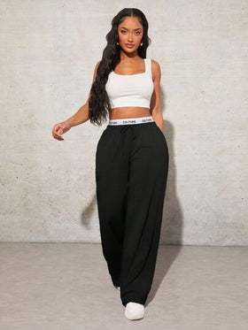 SHEIN SXY بنطلون رياضي واسع الساق أسود بطباعة حرف بسيطة للنساء