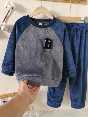 SHEIN طقم بيجاما فلانيل طويل الأكمام شتوي يتكون من سروال وبلوزة مطبوعة برسوم أولاد ملونة