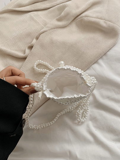 حقيبة كروسبودي ذات زخارف من اللؤلؤ فاخرة وفنية صغيرة ، حقيبة هاتف رسول صغيرة ، وصول جديد صيف 2024