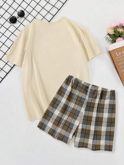 SHEIN طقم ملابس منزلية مكون من ملابس علوية بجيب بأكمام قصيرة وياقة دائرية باللون الأحادي وشورت مربع للرجال