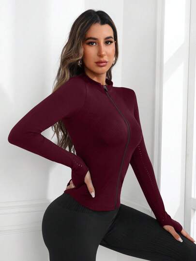 Sport Studio جاكيت رياضية طويلة الأكمام بثقب الإبهام ومطابقة للحجم ذات لون أحادي، ملابس الخريف
