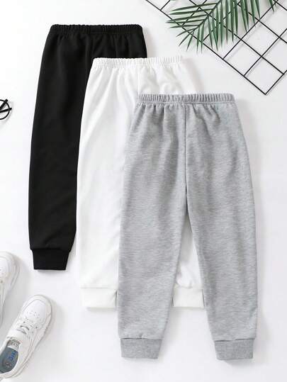 SHEIN بنطلون كاجوال مستقيم الساق ذو خصر مطاطي مخطط أزياء للفتى الصغير