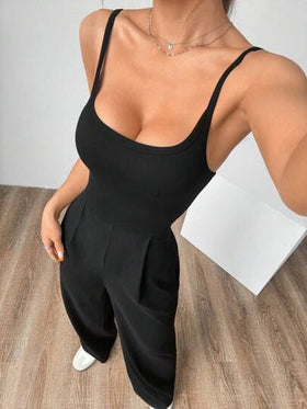 Flirla جمبسوت فضفاضة بلا أكمام لون أسود سادة