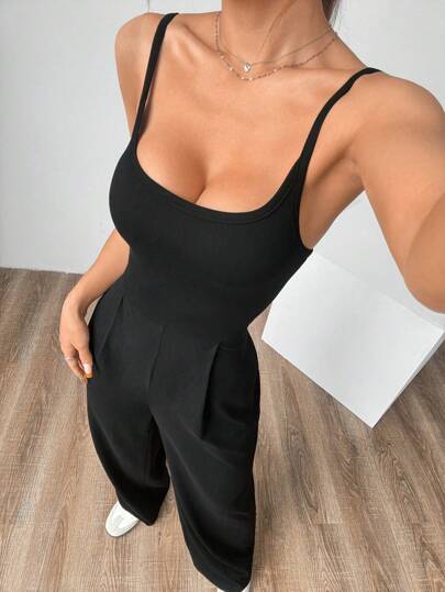 Flirla جمبسوت فضفاضة بلا أكمام لون أسود سادة