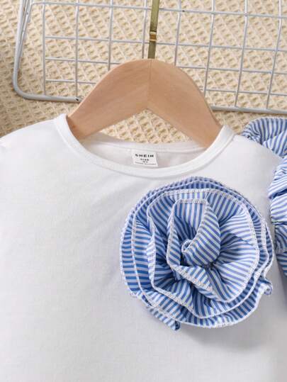 SHEIN رمضان طقم بلوزة مزهرة بأكمام كشكشة وبنطال مخطط للفتاة الصغيرة 2قطعة, مناسب للارتداء في الخارج في الخريف