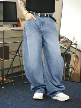 Manfinity Denimwave جينز فضفاض بقصة برميل مغسول بلون أزرق فاتح مهترئ بطراز الشارع الرجالي من حقبة Y2K