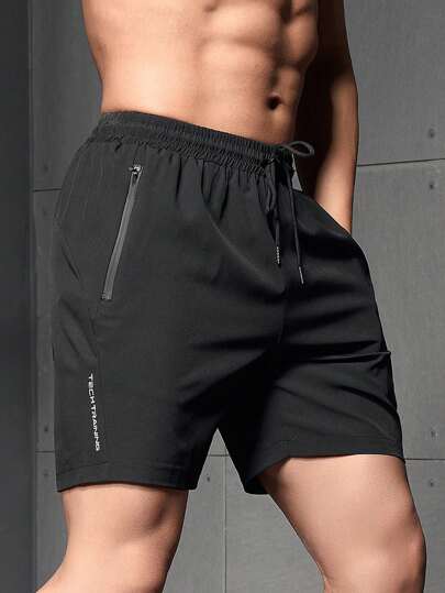 Manfinity Sport Corelite شورت رياضي للرجال من مانفينيتي بجيب سحاب ورسومات حرفية، قطعة مرنة، شورت جوجر "أحب حبيبي" بشعار الفخر، شورت رياضة وتمرين، بنطلون رياضي، شورت أسود