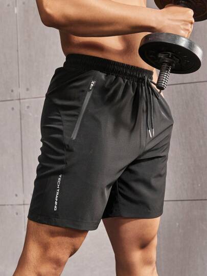 Manfinity Sport Corelite شورت رياضي للرجال من مانفينيتي بجيب سحاب ورسومات حرفية، قطعة مرنة، شورت جوجر "أحب حبيبي" بشعار الفخر، شورت رياضة وتمرين، بنطلون رياضي، شورت أسود