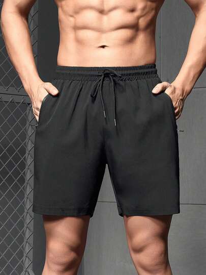 Manfinity Sport Corelite شورت رياضي للرجال من مانفينيتي بجيب سحاب ورسومات حرفية، قطعة مرنة، شورت جوجر "أحب حبيبي" بشعار الفخر، شورت رياضة وتمرين، بنطلون رياضي، شورت أسود