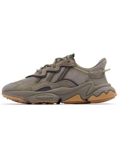 Adidas حذاء OZWEEGO Clover للرجال والنساء بتصميم شبكي عتيق، حذاء رياضي كاجوال منخفض الارتفاع EE6461