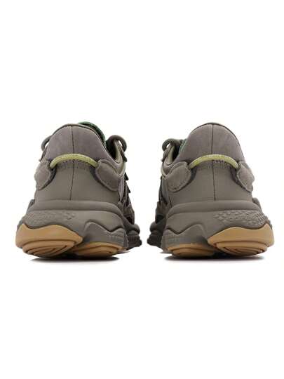 Adidas حذاء OZWEEGO Clover للرجال والنساء بتصميم شبكي عتيق، حذاء رياضي كاجوال منخفض الارتفاع EE6461