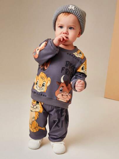 SHEIN Playful Pals طقم ملابس للأطفال الصغار, غير متماثل, مطبوع برسومات الأسد والوحيد القرن, متميز بتصاميم مبهجة للأسد والوحيد القرن على قماش ناعم ومريح, للارتداء الفريد والمرح
