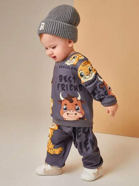 SHEIN Playful Pals طقم ملابس للأطفال الصغار, غير متماثل, مطبوع برسومات الأسد والوحيد القرن, متميز بتصاميم مبهجة للأسد والوحيد القرن على قماش ناعم ومريح, للارتداء الفريد والمرح