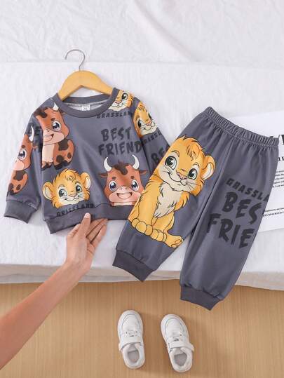 SHEIN Playful Pals طقم ملابس للأطفال الصغار, غير متماثل, مطبوع برسومات الأسد والوحيد القرن, متميز بتصاميم مبهجة للأسد والوحيد القرن على قماش ناعم ومريح, للارتداء الفريد والمرح