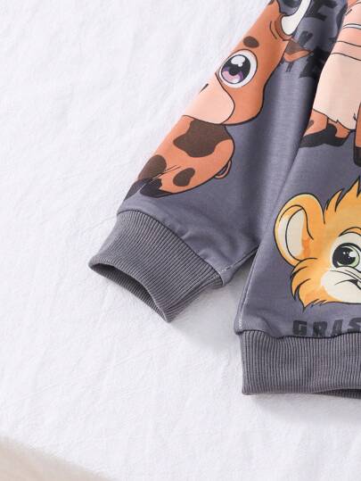 SHEIN Playful Pals طقم ملابس للأطفال الصغار, غير متماثل, مطبوع برسومات الأسد والوحيد القرن, متميز بتصاميم مبهجة للأسد والوحيد القرن على قماش ناعم ومريح, للارتداء الفريد والمرح
