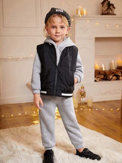 SHEIN طقم جاكيت وبنطلون رياضي 2 قطعة، من الجونيل الكلاسيكي مع لوحة لون متباين للأولاد من عمر 4-7 سنوات، ملابس كاجوال أنيقة مناسبة للعطلات وأعياد الميلاد واليومية، مناسب للخريف والربيع والشتاء