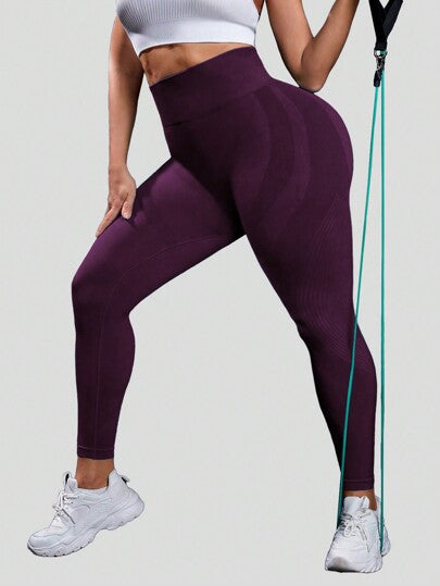 Sport Studio سراويل رياضية للمؤخرة المرفوعة بدون غرز ذات لون أحادي لحجم كبير من النساء