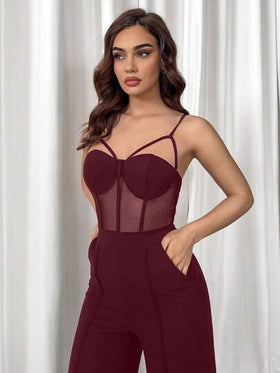 Aloruh جمبسوت قصيرة جذابة لون واحد مصنوعة من شبكة نسيج مع تصميم مفتوح على الجزء الأوسط