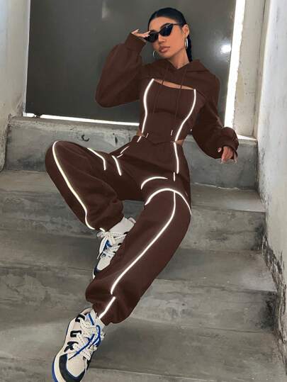 SHEIN EZwear مجموعة رياضية مريحة للنساء مكونة من هوديي وبنطلون رياضي، ذات ترصيع عاكس وسحاب، مناسبة للموسم الانتقالي