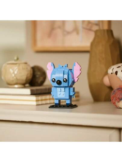 LEGO BrickHeadz 40674 - ستيتش: لعبة بناء مسلية للأعمار 10 سنوات فما فوق، هدية مثالية لعشاق ديزني، تحفز الإبداع والخيال، تصميم قابل للجمع لغرض العرض