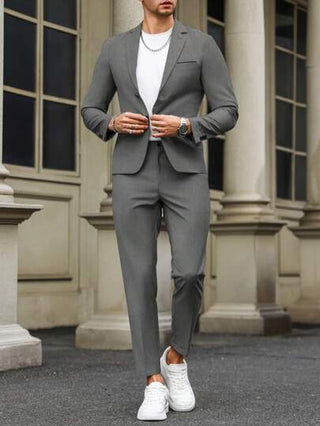 Manfinity Bizformal بدلة رجالية قطعتين تتكون من ملابس علوية بأكمام طويلة من لون واحد ذو ياقة مسطحة وأزرار أمامية، وبنطلون طويل، تصميم بسيط