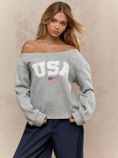 MISSGUIDED سويت شيرت كتف واسع بطباعة الصوف رباعي تموز, الولايات المتحدة الأمريكية