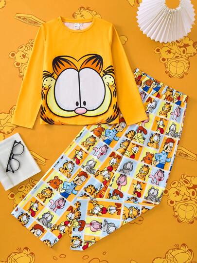 بيجاما GARFIELD X  مجموعة من قطعتين للبيجامة للفتيات البالغات، تشمل تي شيرت أكمام طويلة برقبة دائرية وسراويل مناسبة للراحة مطبوعة بطراز رقيق ومحبب ومضاد للحريق