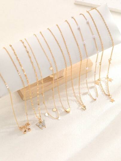 7 قطع مجموعة قلادة أنيقة عصرية بتصميم عتيق متعدد الطبقات، تشمل قلادات بشكل فراشة وقلب ونجمة وهندسية ومخرزة وفارغة وشرابة، سلاسل ثعبان ناعمة وسلاسل مربعة، بأسلوب بسيط، مناسبة للعطلات والحفلات والمواعيد والهدايا والاستخدام اليومي